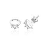 white gold open oval stud earrings with three clear stones on white background