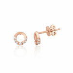 rose gold open circle stud earrings with clear stones on white background