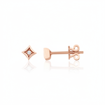 rose gold star-shaped stud earrings with a single clear stone on white background