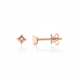 rose gold star-shaped stud earrings with a single clear stone on white background