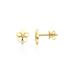 yellow gold flower stud earrings with clear stones on white background