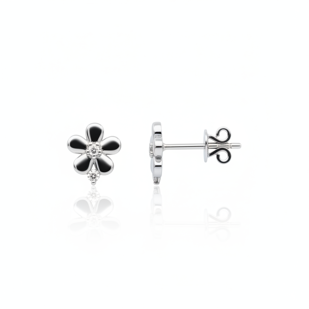 white gold flower stud earrings with clear stones on white background