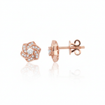 rose gold swirl rosette stud earrings with clear stones on white background