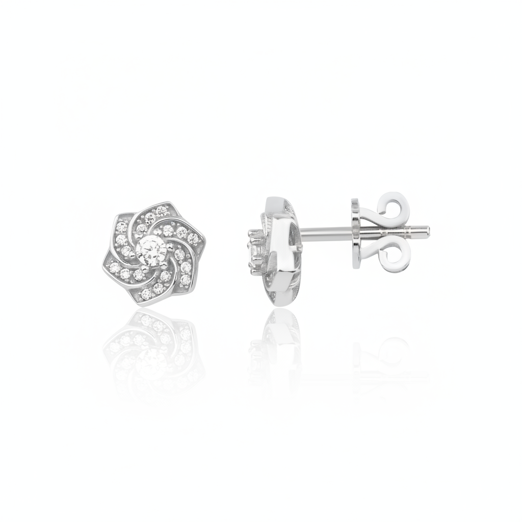 white gold swirl rosette stud earrings with clear stones on white background