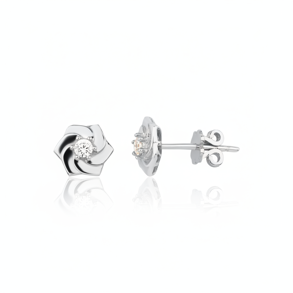 white gold pinwheel petal stud earrings with a single clear stone on white background