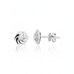 white gold pinwheel petal stud earrings with a single clear stone on white background