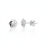white gold pinwheel petal stud earrings with a single clear stone on white background