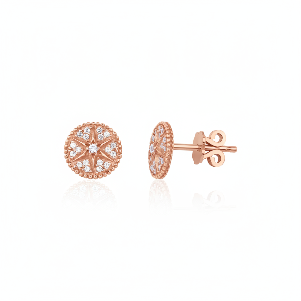 rose gold star medallion stud earrings with clear stones on white background