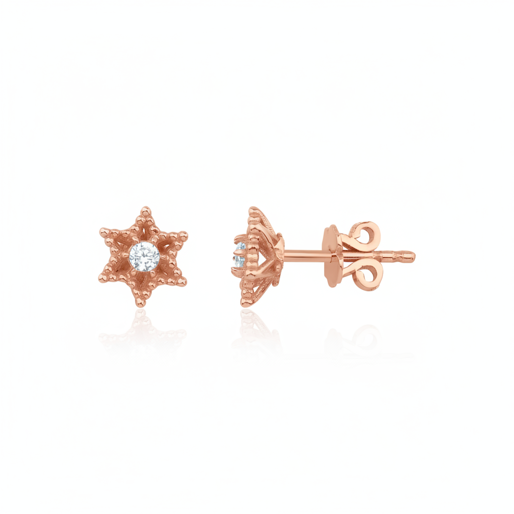 rose gold six-pointed star stud earrings with a central clear stone on white background