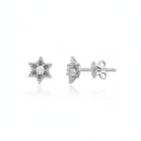 white gold six-pointed star stud earrings with a central clear stone on white background