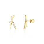 yellow gold crossed bar stud earrings with clear stones on white background