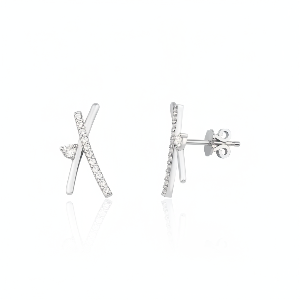 white gold crossed bar stud earrings with clear stones on white background