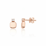 rose gold cushion stud earrings with a single clear stone on white background