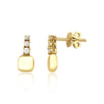 yellow gold trio drop stud earrings with clear stones on white background