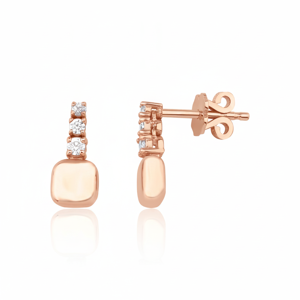 rose gold trio drop stud earrings with clear stones on white background