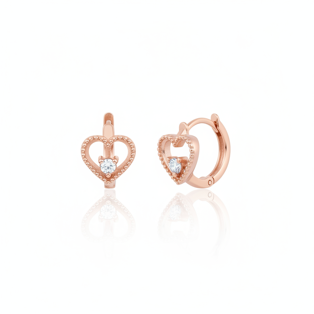rose gold beaded open heart huggie hoop earrings with a single clear stone on white background