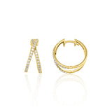 yellow gold criss-cross hoop earrings with clear stones on white background