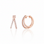 rose gold criss-cross hoop earrings with clear stones on white background
