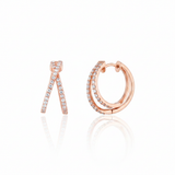 rose gold criss-cross hoop earrings with clear stones on white background