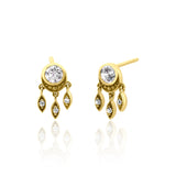 yellow gold stud earrings with dangling leaf charms and clear stones on white background