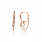 rose gold double hoop earrings with a dangling clear round stone on white background