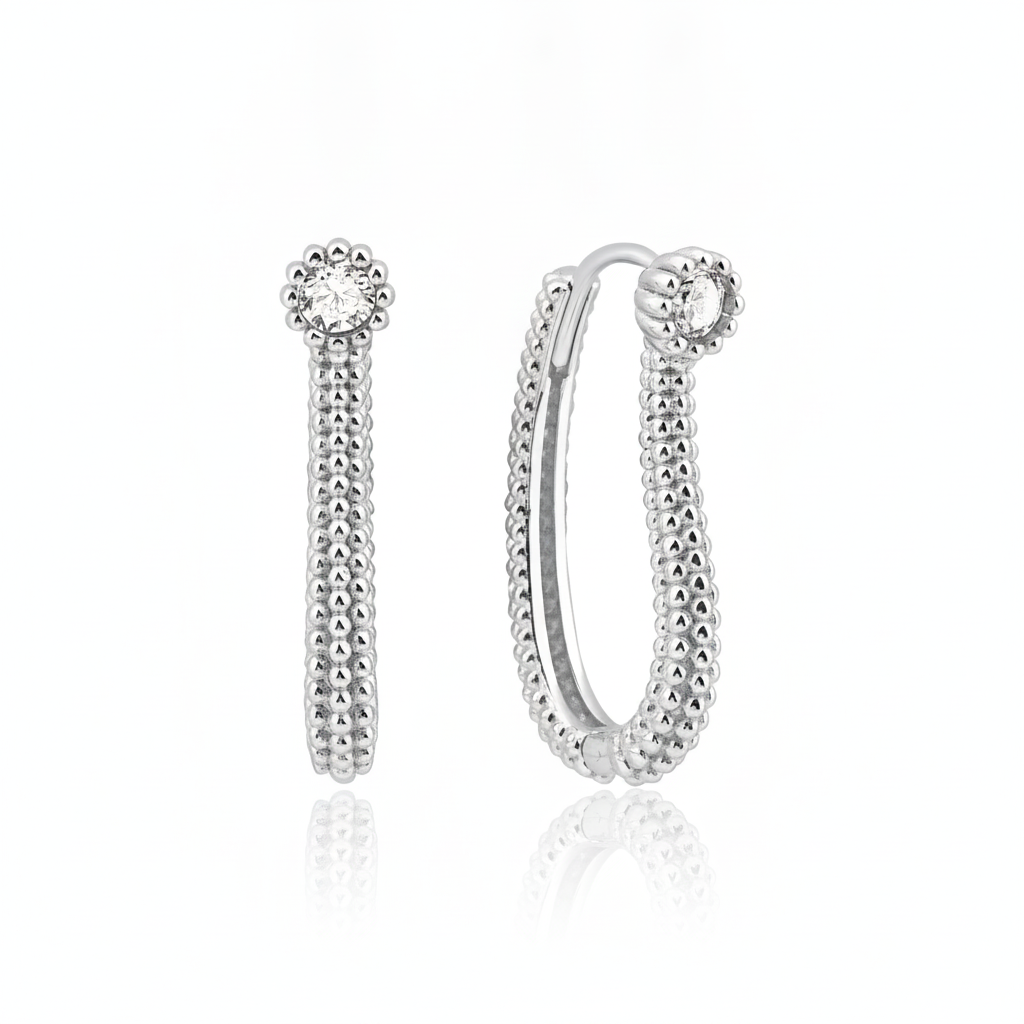 white gold beaded oval hoop earring with a White CZ stone on white background