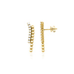 yellow gold beaded curve earrings with clear stones on white background