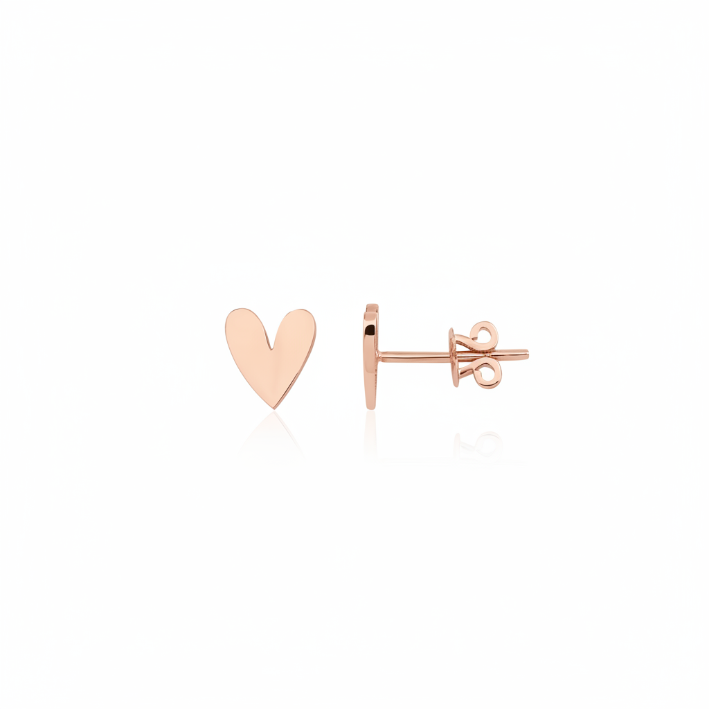 rose gold asymmetric heart stud earrings on white background