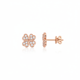 rose gold four-leaf clover stud earrings on white background