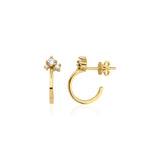 yellow gold open hoop earrings with cluster of stones on white background