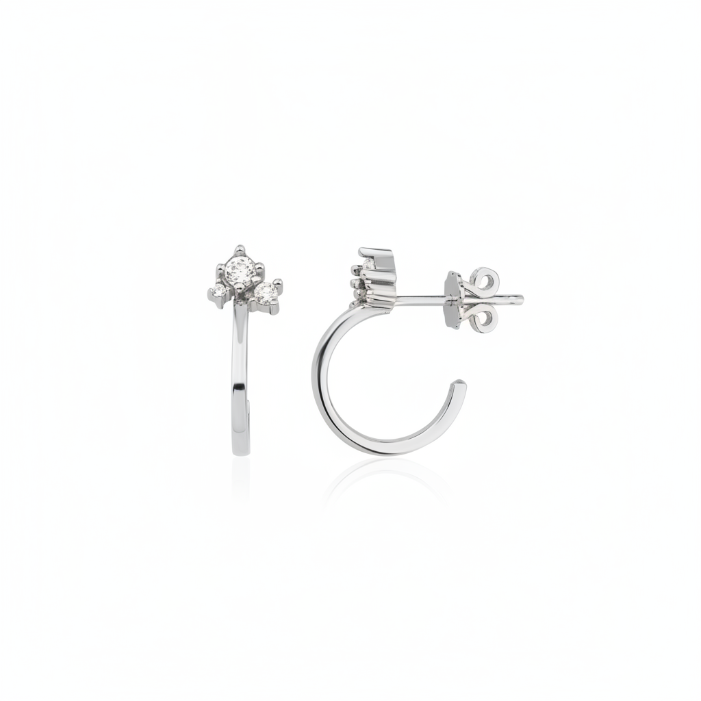 white gold open hoop earrings with cluster of stones on white background