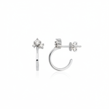 white gold open hoop earrings with cluster of stones on white background