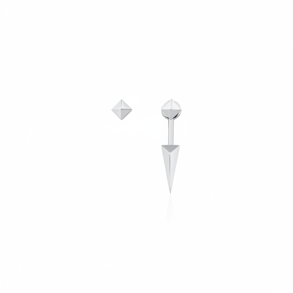 white gold faceted pyramid and spike drop stud earrings on white background