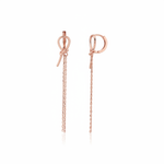 rose gold knot huggie hoop earrings with drop chains on white background