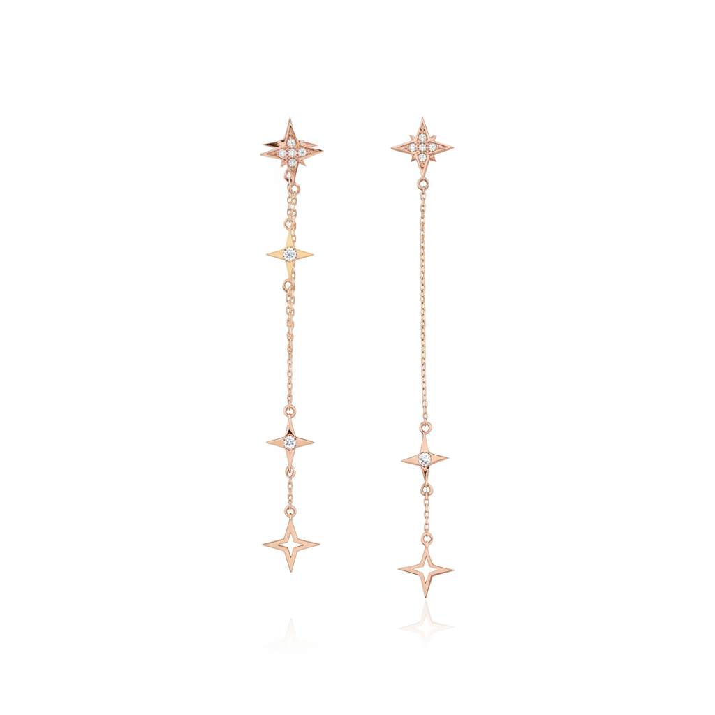 rose gold asymmetrical starburst drop earrings on white background