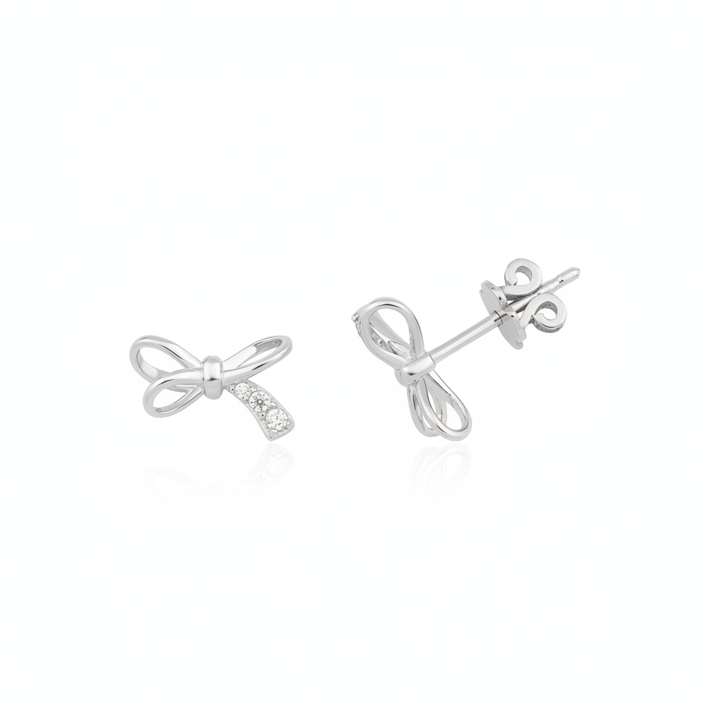 white gold bow stud earrings with accent stones on white background