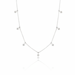white gold chevron drop necklace on white background