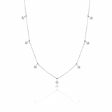 white gold chevron drop necklace on white background
