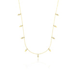 yellow gold triangle charm necklace on white background