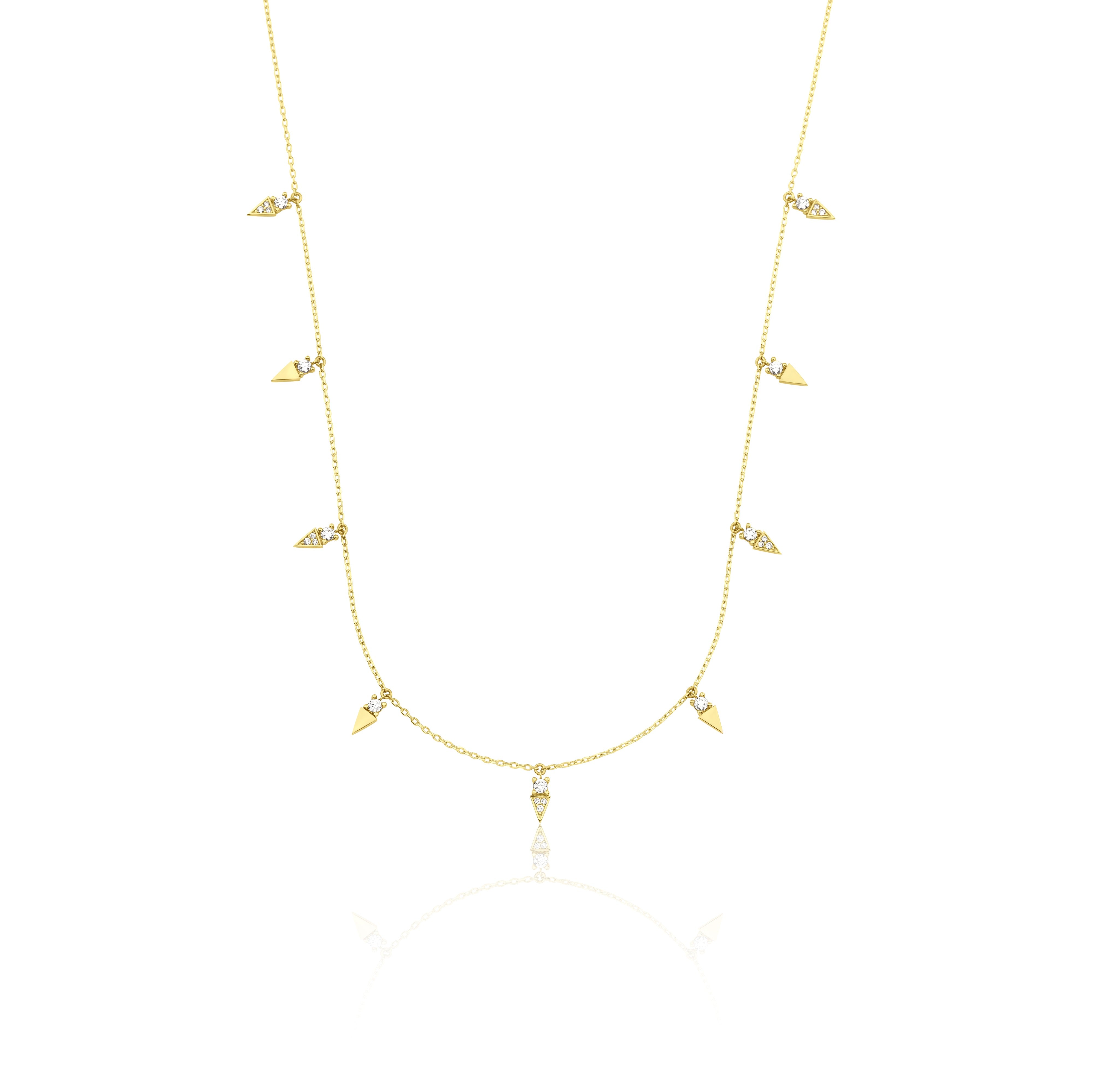 yellow gold triangle charm necklace on white background