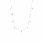 white gold triangle charm necklace on white background