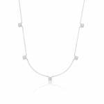 white gold four-petal flower station necklace on white background