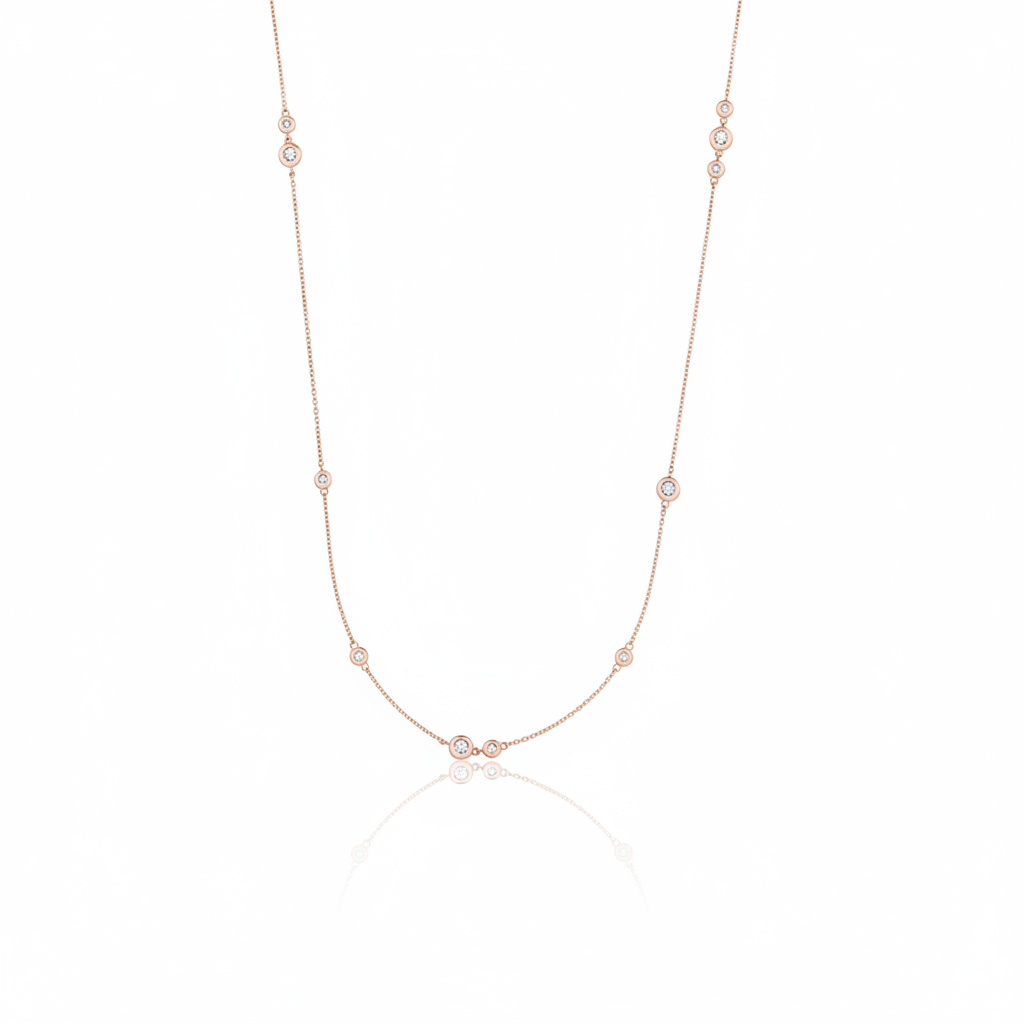 rose gold scattered stone necklace on white background
