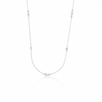 white gold scattered stone necklace on white background