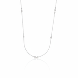 white gold scattered stone necklace on white background