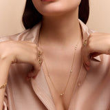 model wearing the gold scattered stone necklace