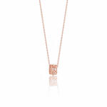 rose gold barrel pendant necklace on white background