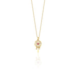 yellow gold talisman wheel necklace on white background