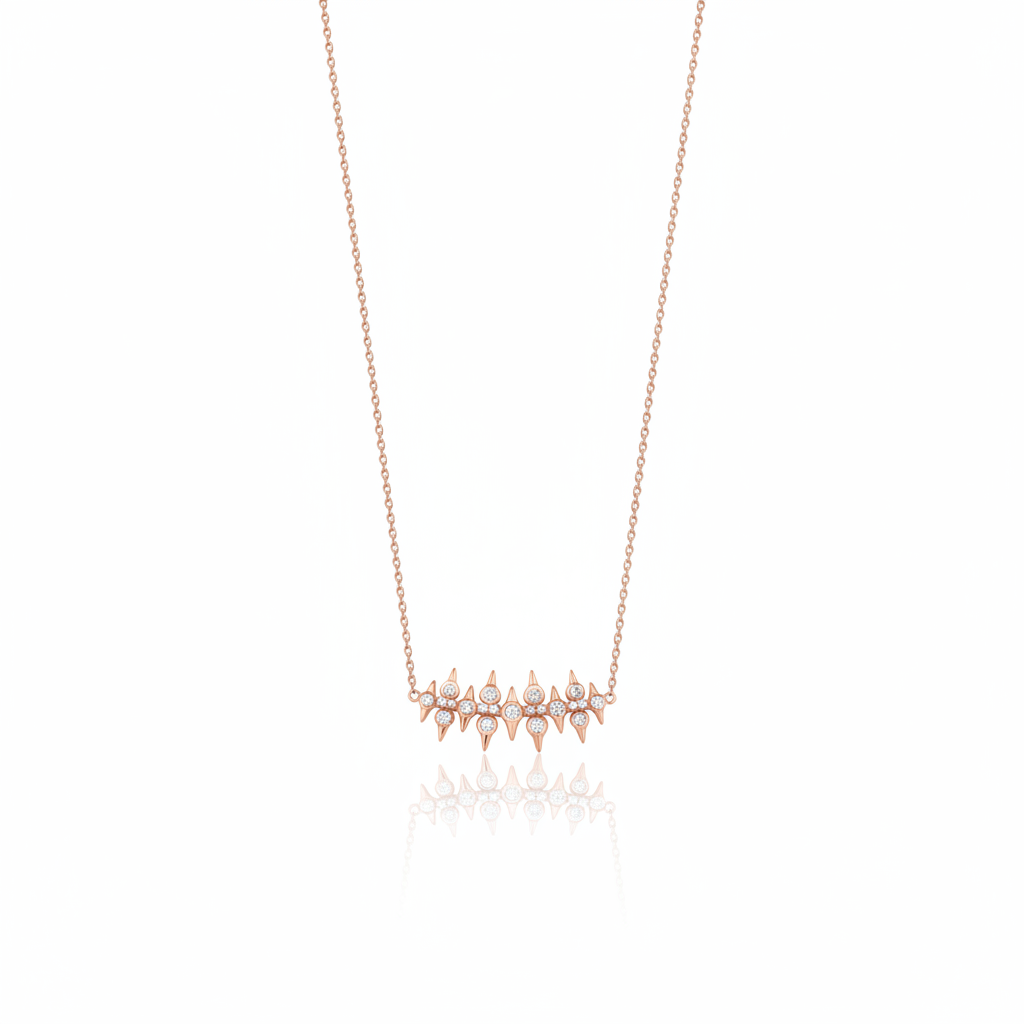 rose gold spike bar necklace on white background