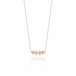 rose gold spike bar necklace on white background